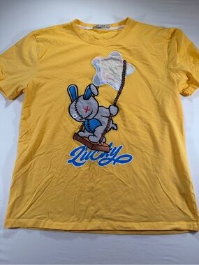 Yellow Graphic Tee with Bunny Swing Design Lucky charm